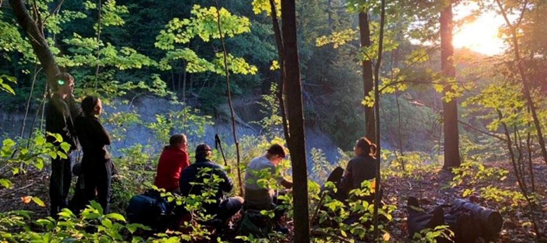A group of students backpacking