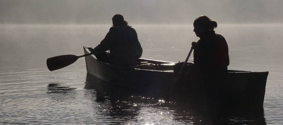 Canoeing at sunrise