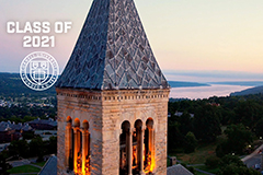 Class of 2021 and Cornell seal over McGraw Tower