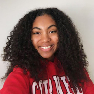 Destiny Smith wears a red and white Cornell sweatshirt