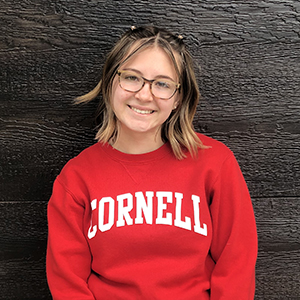 Libby Willkomm wears a red and white Cornell sweatshirt