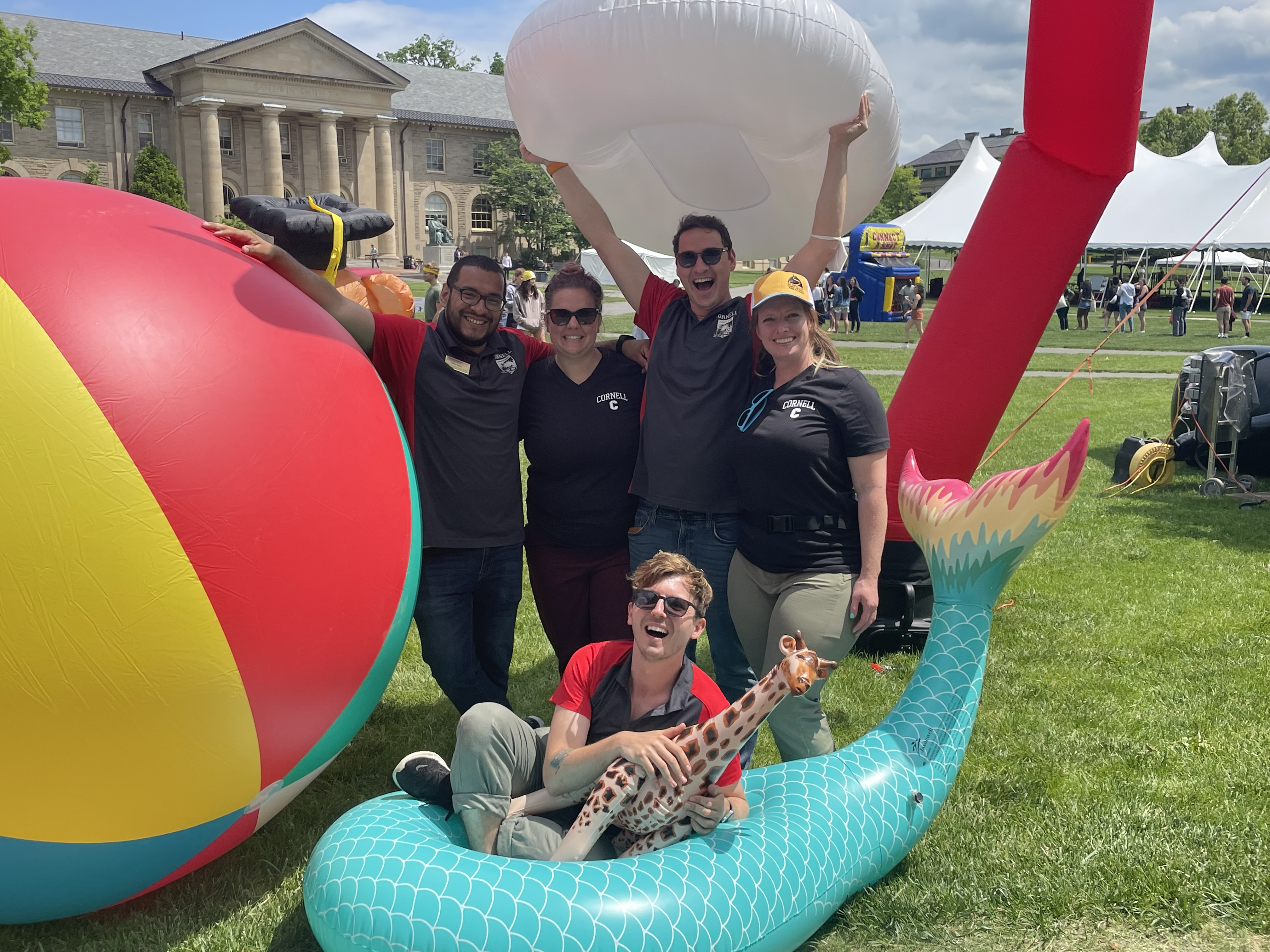 The Campus Activities events team with large inflatables on the Arts Quad.