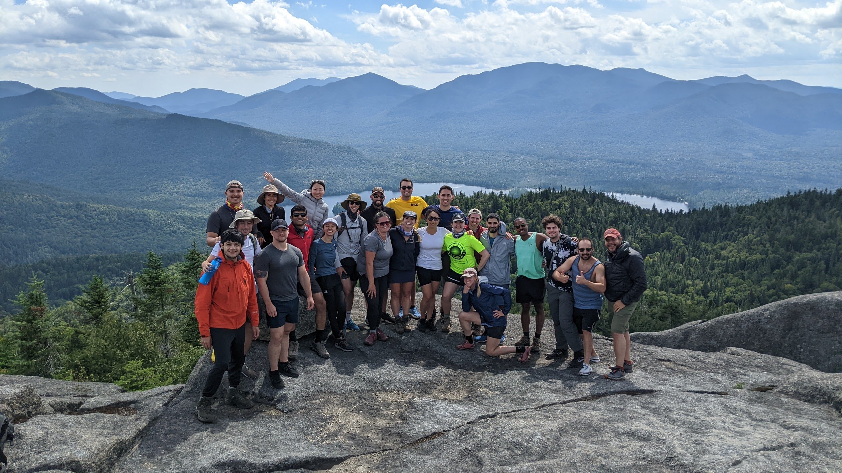 Group of students standing on rocky mountain top