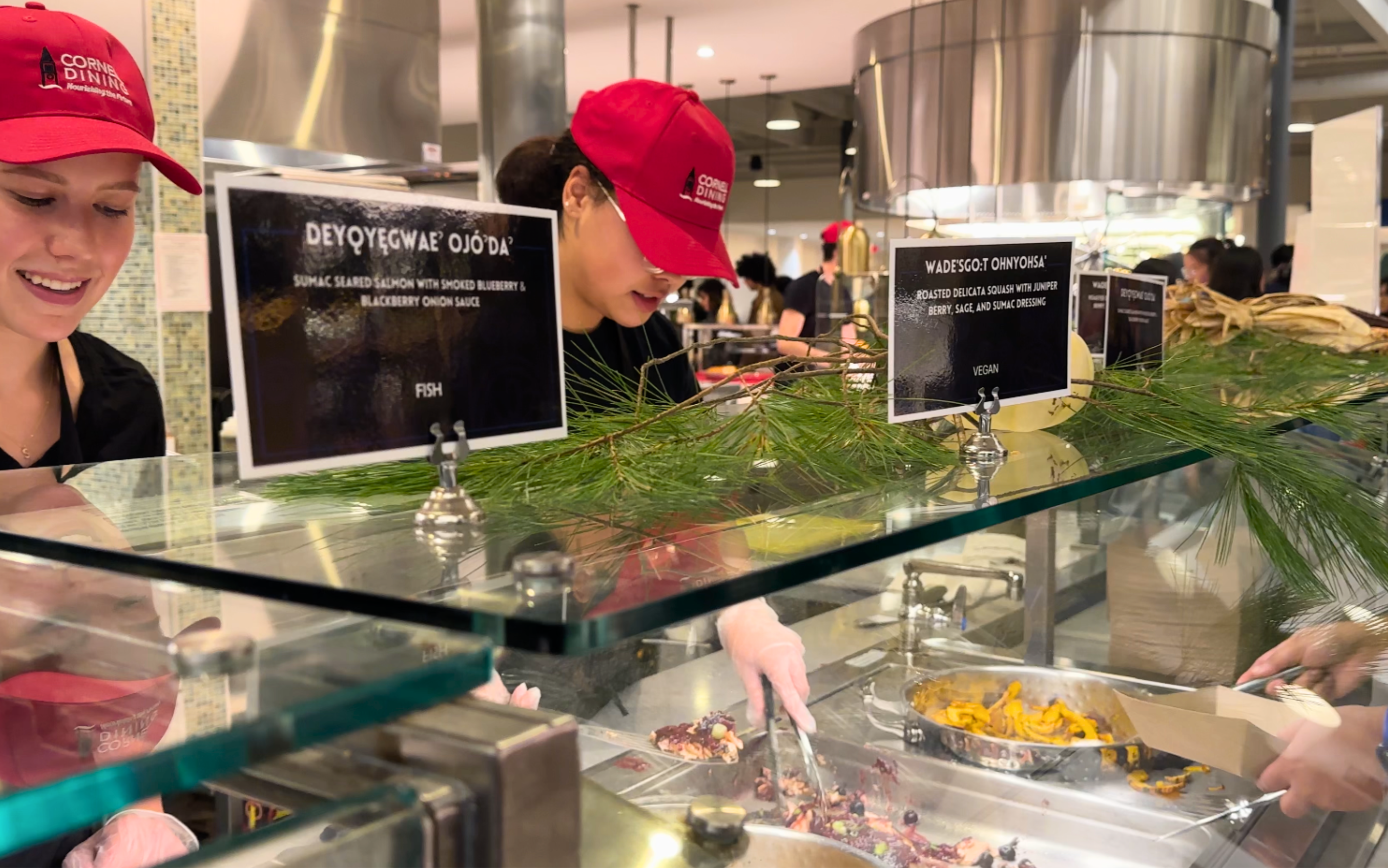 Students serve food at Indigenous Dinner night at Morrison Dining