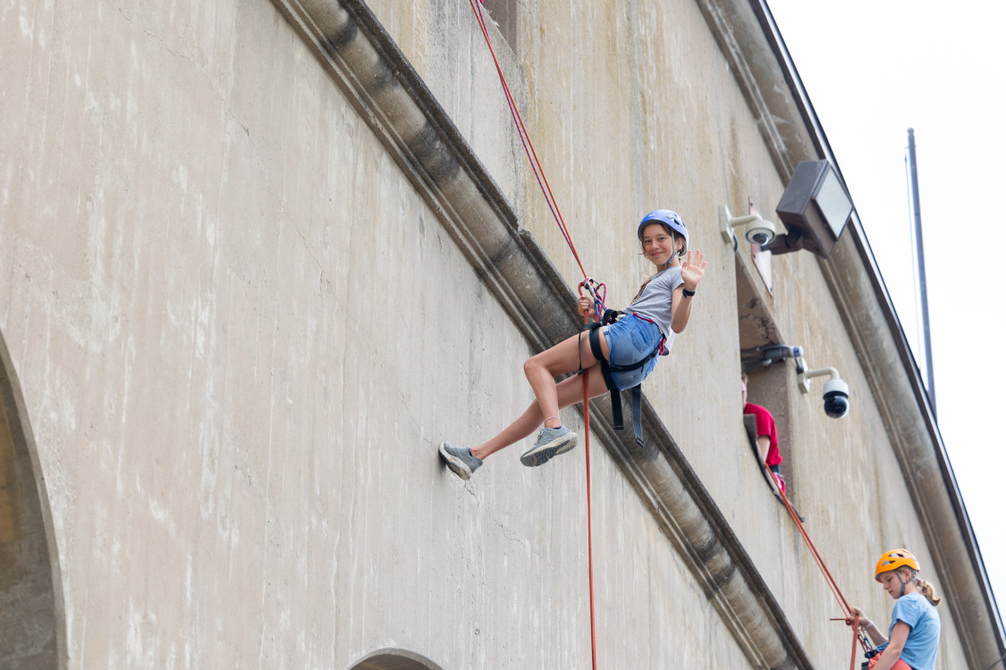 kids rappeling from stadium