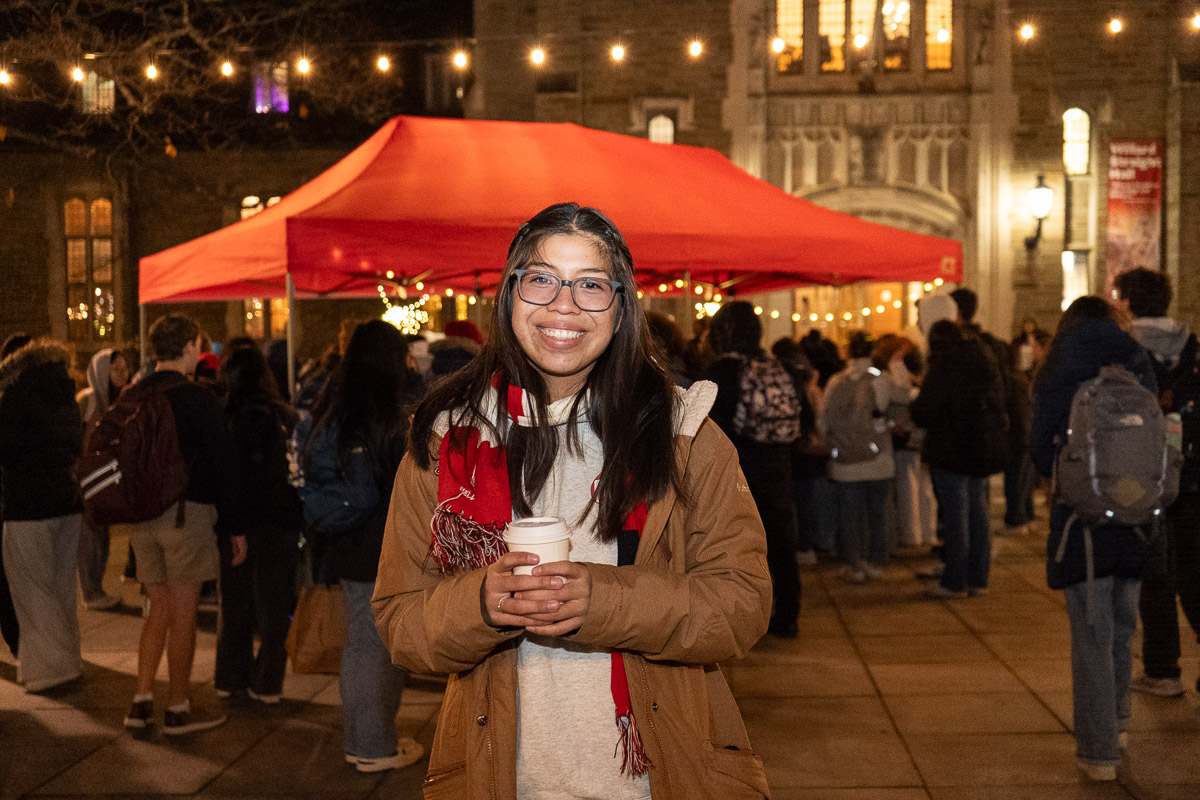 Cornell Minds Matter's Zoey Preza poses in front of Willard Straight Hall