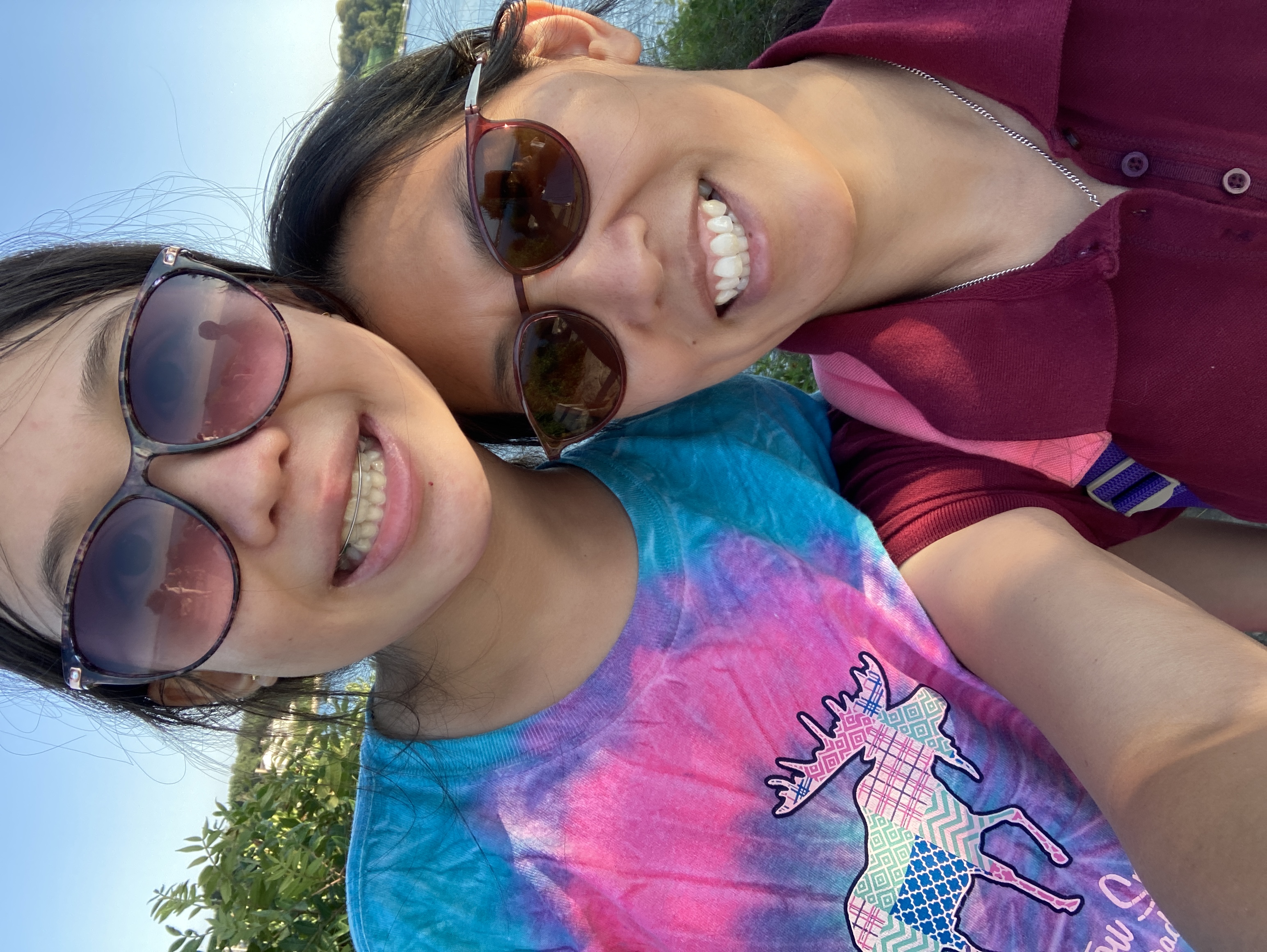 Betty Eng and her daughter near a lake