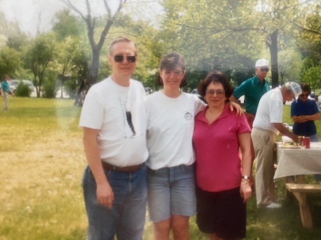 Photo of Lisa Rangel '92 and her parents at a friend's Cornell graduation barbecue