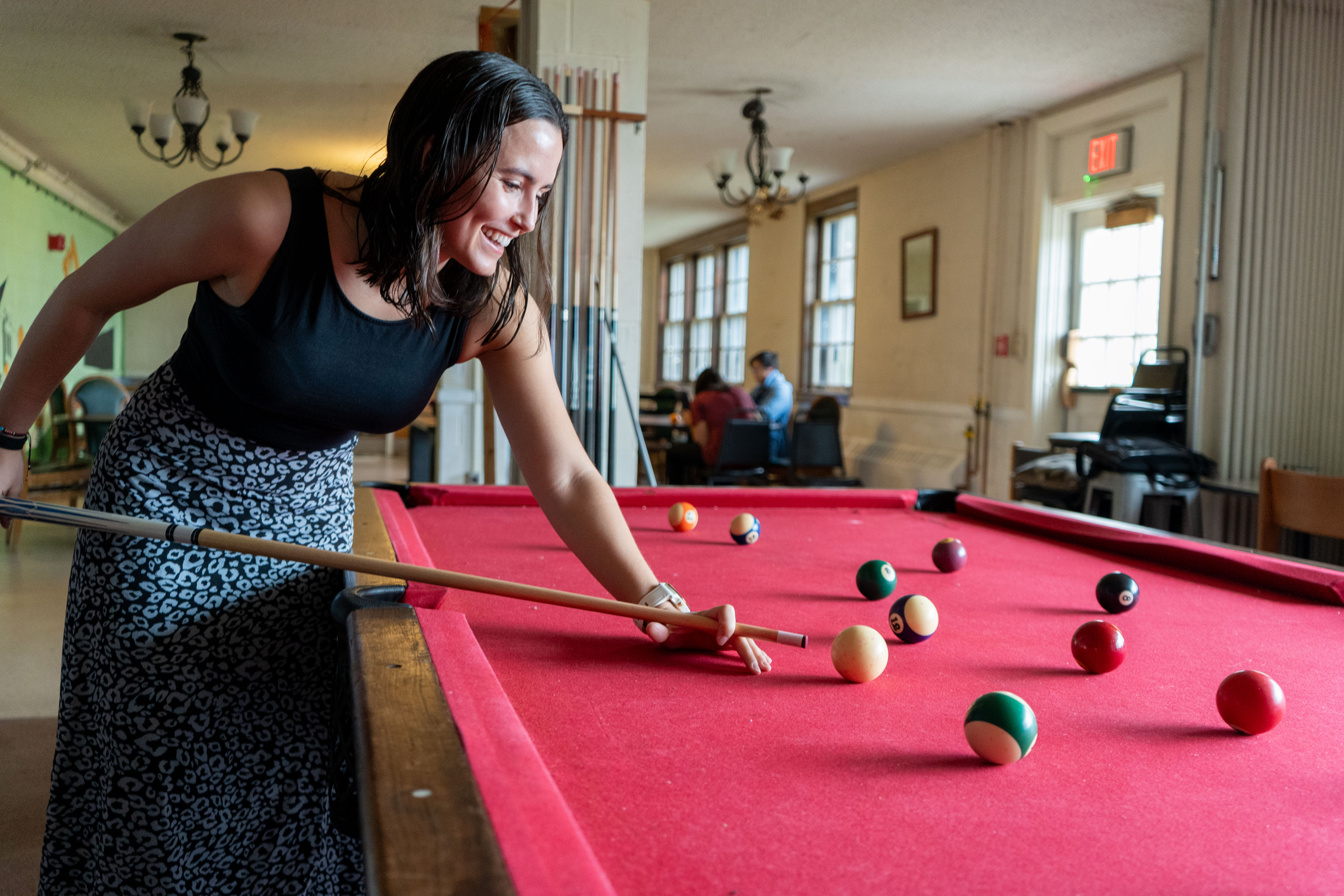 Raquel Soto playing pool at Redbud