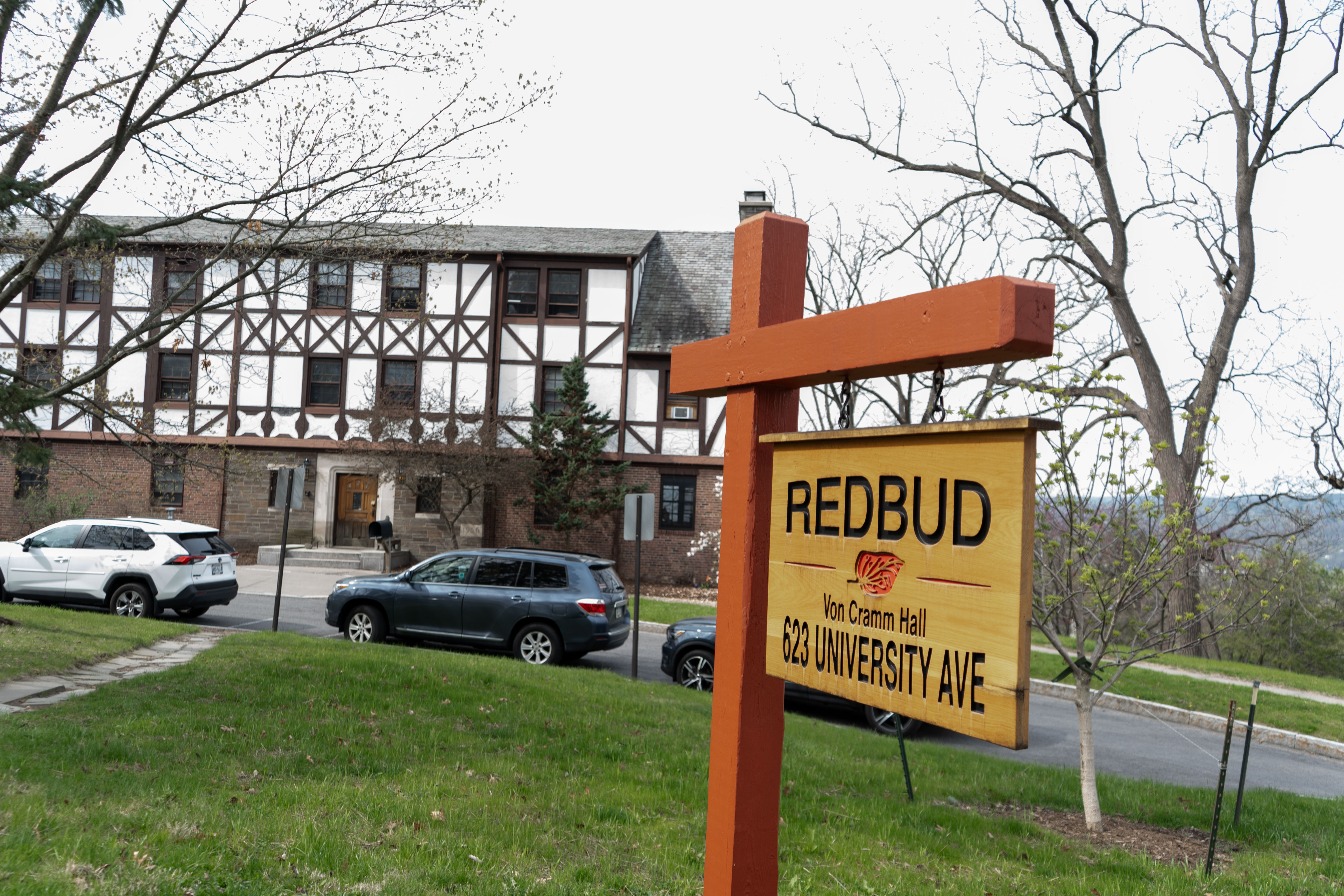 Exterior photo of Redbud and sign