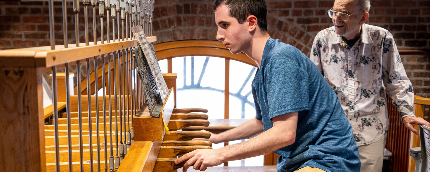 Student playing the chimes 