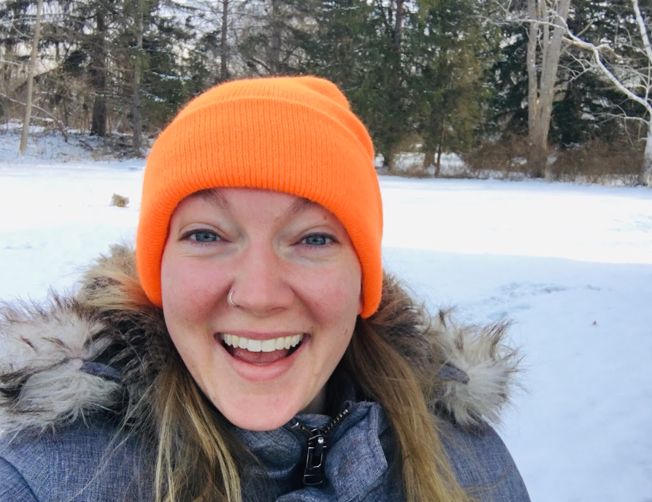 Linnea smiling in the winter sun 