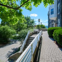 Exterior of Cascadilla Hall showcases the stairs and walkway.