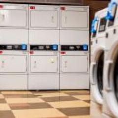 laundry room with washers and dryers