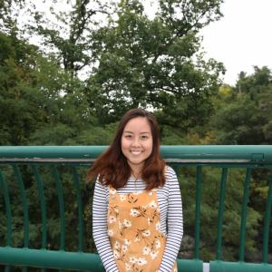 Image of student on north campus bridge