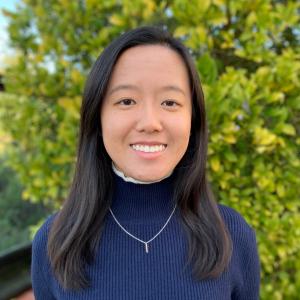 Image of student on north campus bridge