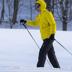 A student cross-country skiing