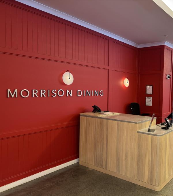 The entrance to Morrison Dining with a red wall