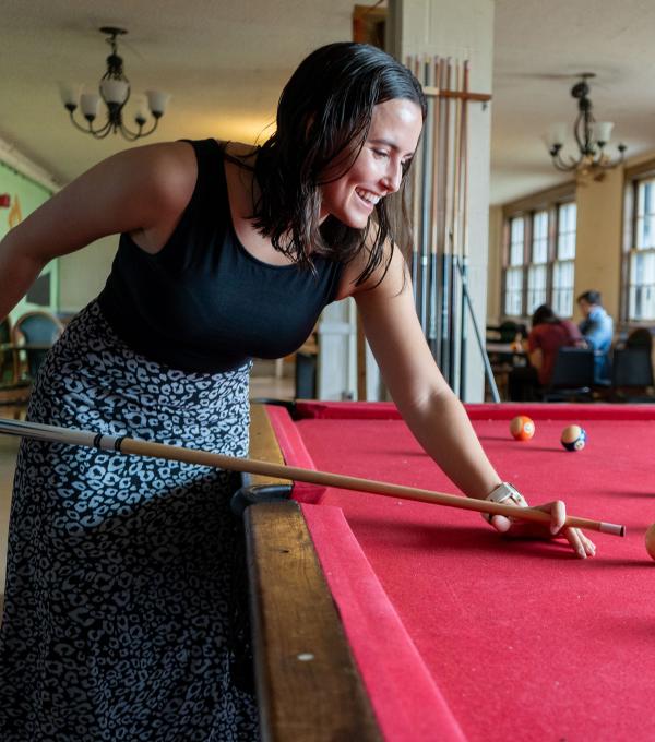 Raquel Sarabia plays pool at Redbud