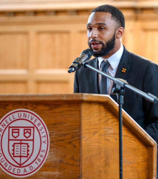 Master’s degree student Cameron White ’24 accepts the 30th annual James A. Perkins Prize for Interracial and Intercultural Peace and Harmony, on behalf of Black Student Empowerment.
