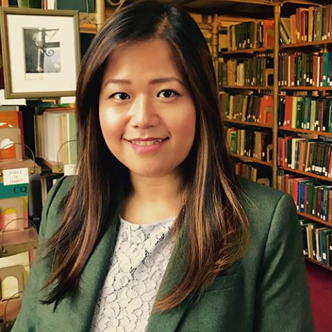 Christina Liang stands in AD White Library