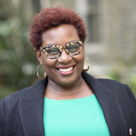 Marla Love stands in front of willard straight hall