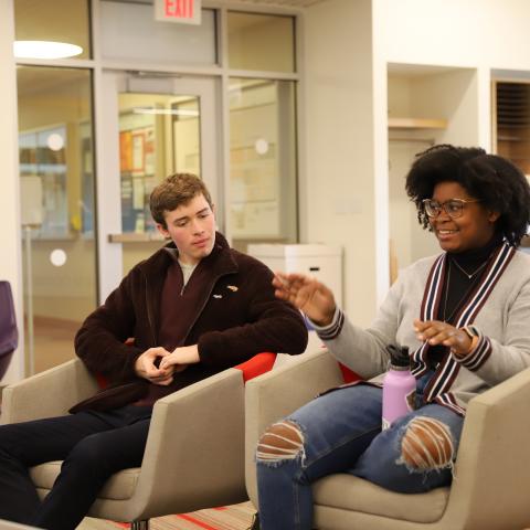 Students chatting in the Cornell Engaged Hub