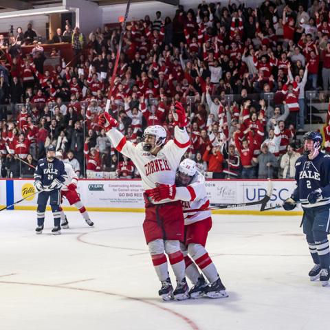 Cornell hockey students on the ice playing