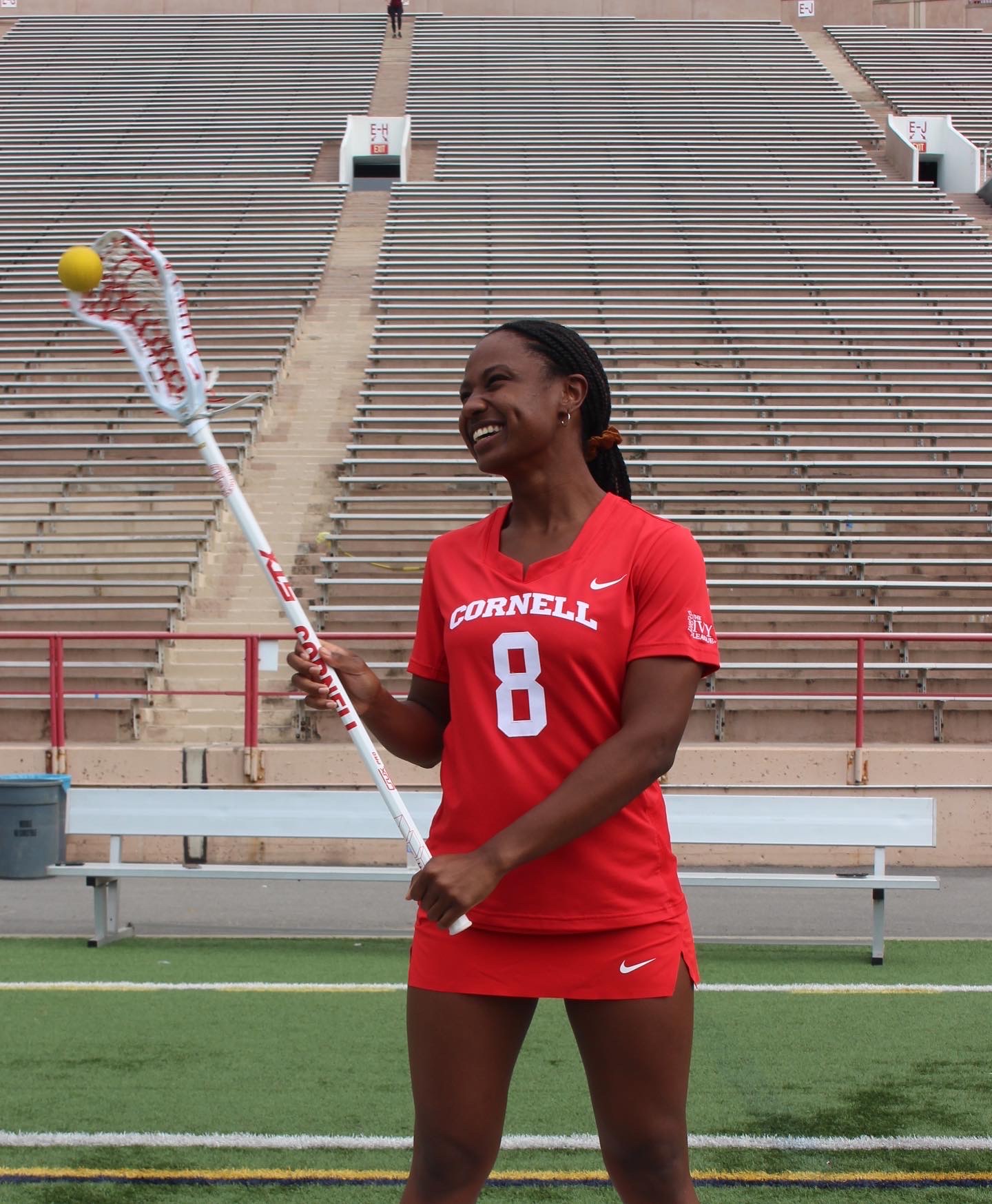 Cornell Lacrosse player Ashleigh Gundy '22 poses on the field.