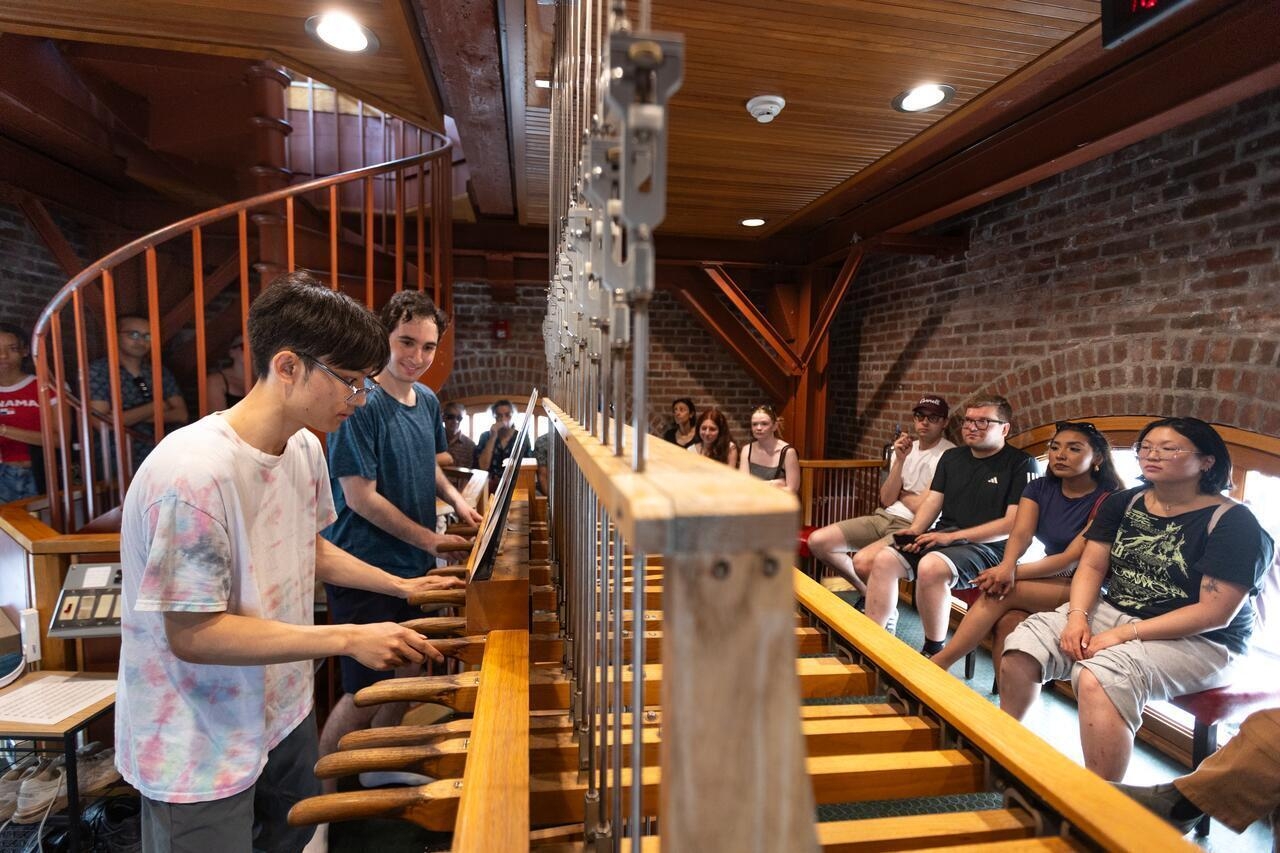 sudents playing the chimes and giving a chimes concert