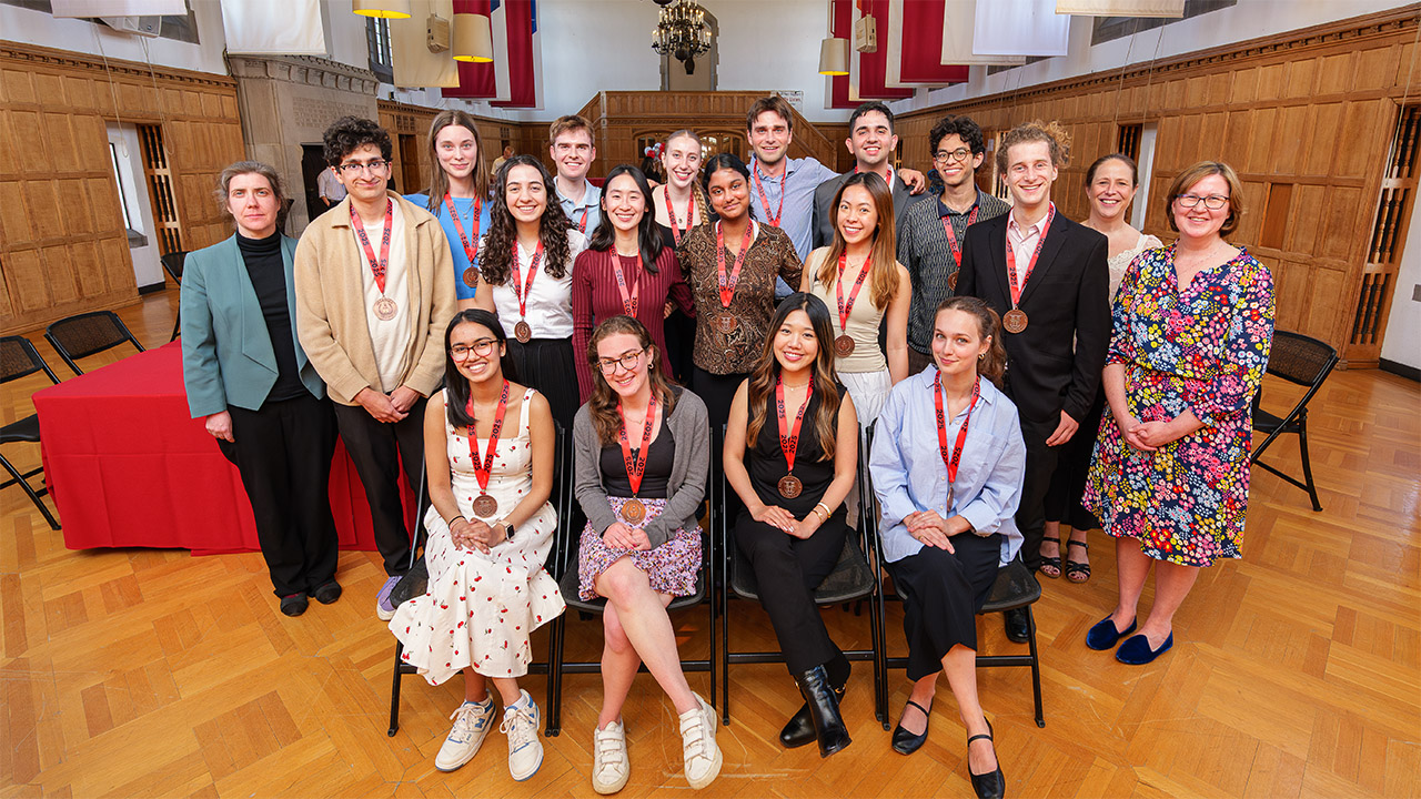 Spring fellowship students gather in the Memorial Room for a photo in 2025