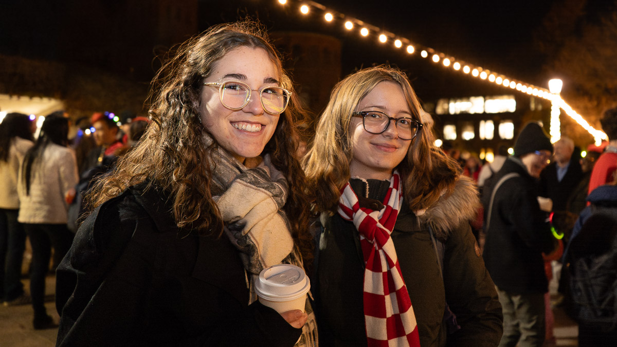 Two students at the Light Up the Season event