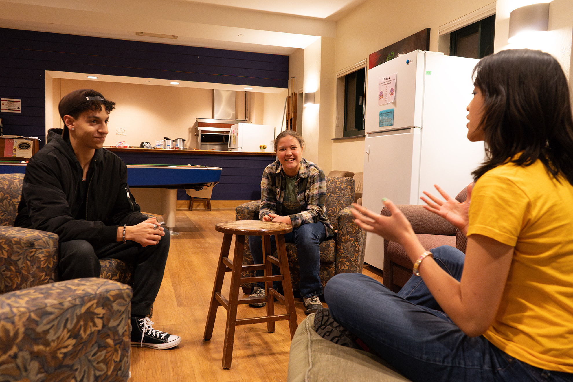 Ecology House residents hang out in the Fireside Lounge