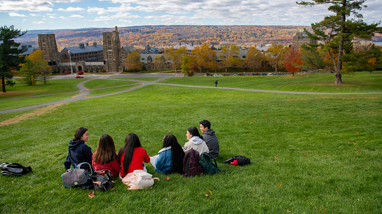 Students sitting on Libe Slope