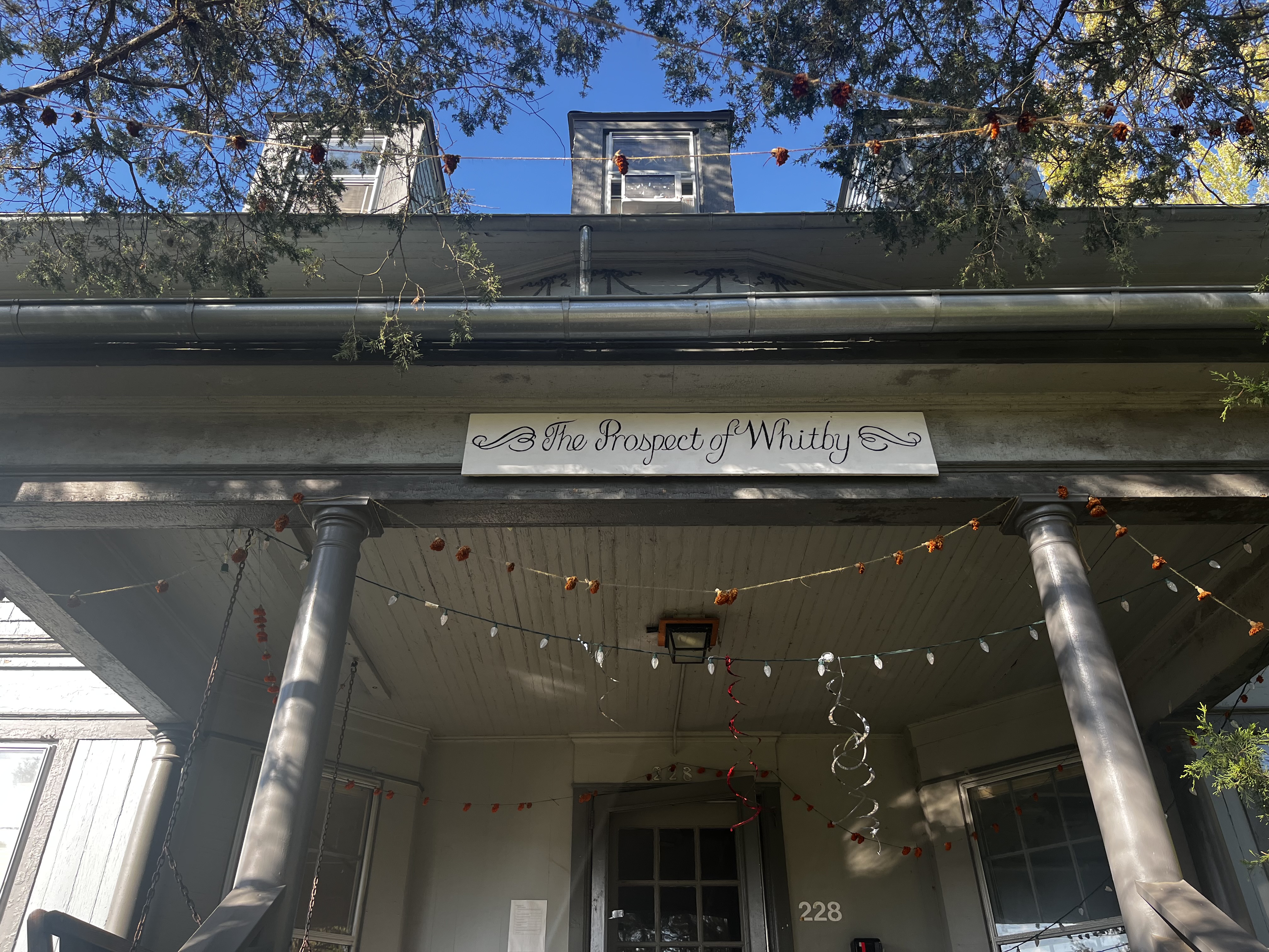 Photo of Prospect of Whitby's front porch sign that says "Prospect of Whitby"