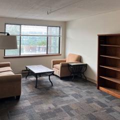 View of the living room in an apartment at 301 College Avenue