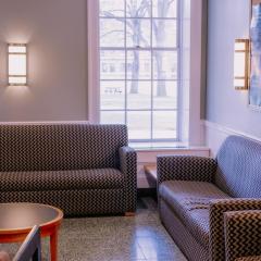 Lounge space in Clara Dickson Hall with two couches and a coffee table