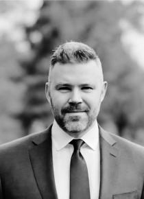Black and white photo of Dan Sweeney