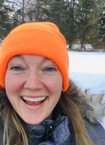 Linnea smiling in the winter sun 