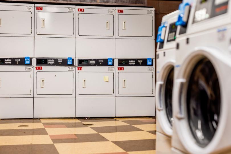 laundry room with washers and dryers