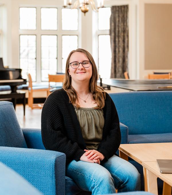 Kira Pawletko '26 sits for a portrait in the lounge of EEC.