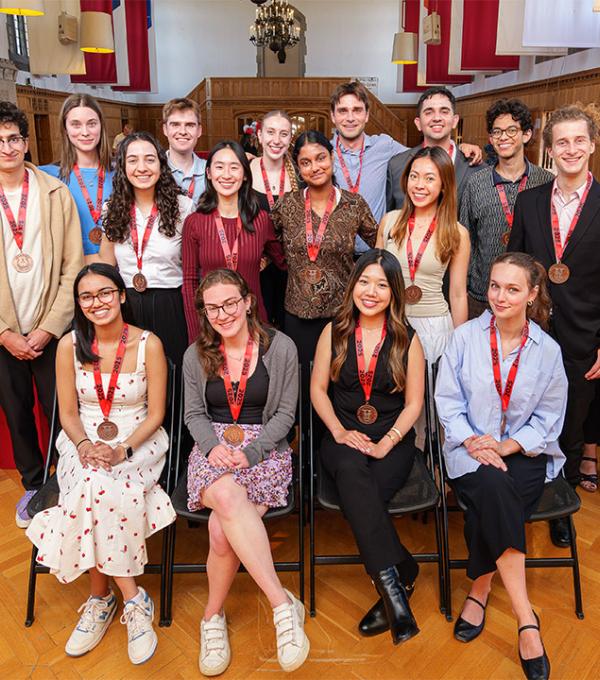 Spring fellowship students gather for a photo in the Memorial Room in 2025