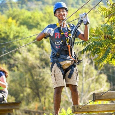 Durjoy Bhadra ’29, on the ropes course at Greek Peak Mountain Resort in Cortland, New York. 