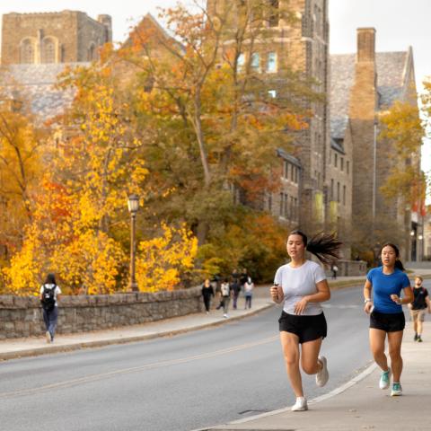 Two students jogging near collegetown.