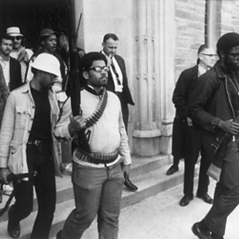 The Pulitzer Prize-winning photo of Cornell students emerging from Willard Straight Hall after the takeover (Associated Press Images/Steve Starr)