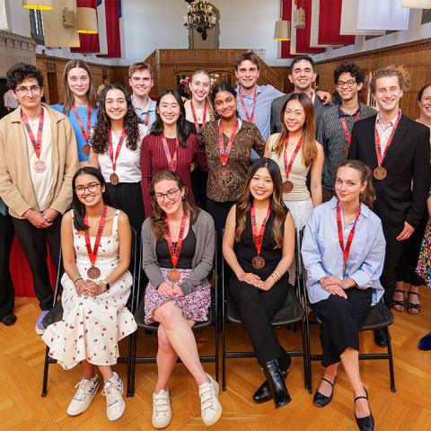 Spring fellowship students gather for a photo in the Memorial Room in 2025