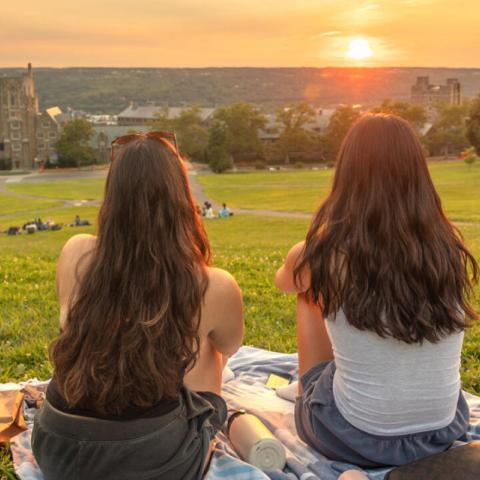 students sitting on libe slope