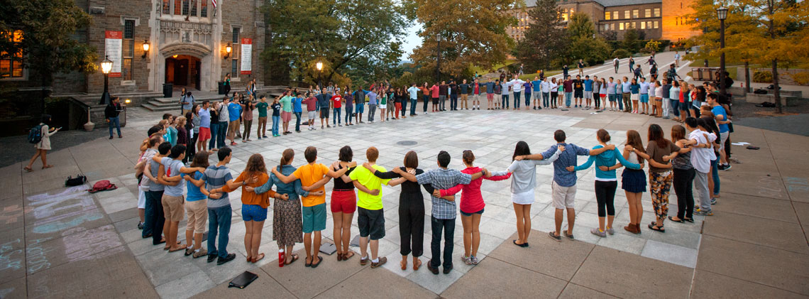 Students gather in front of Willard Straight Hall