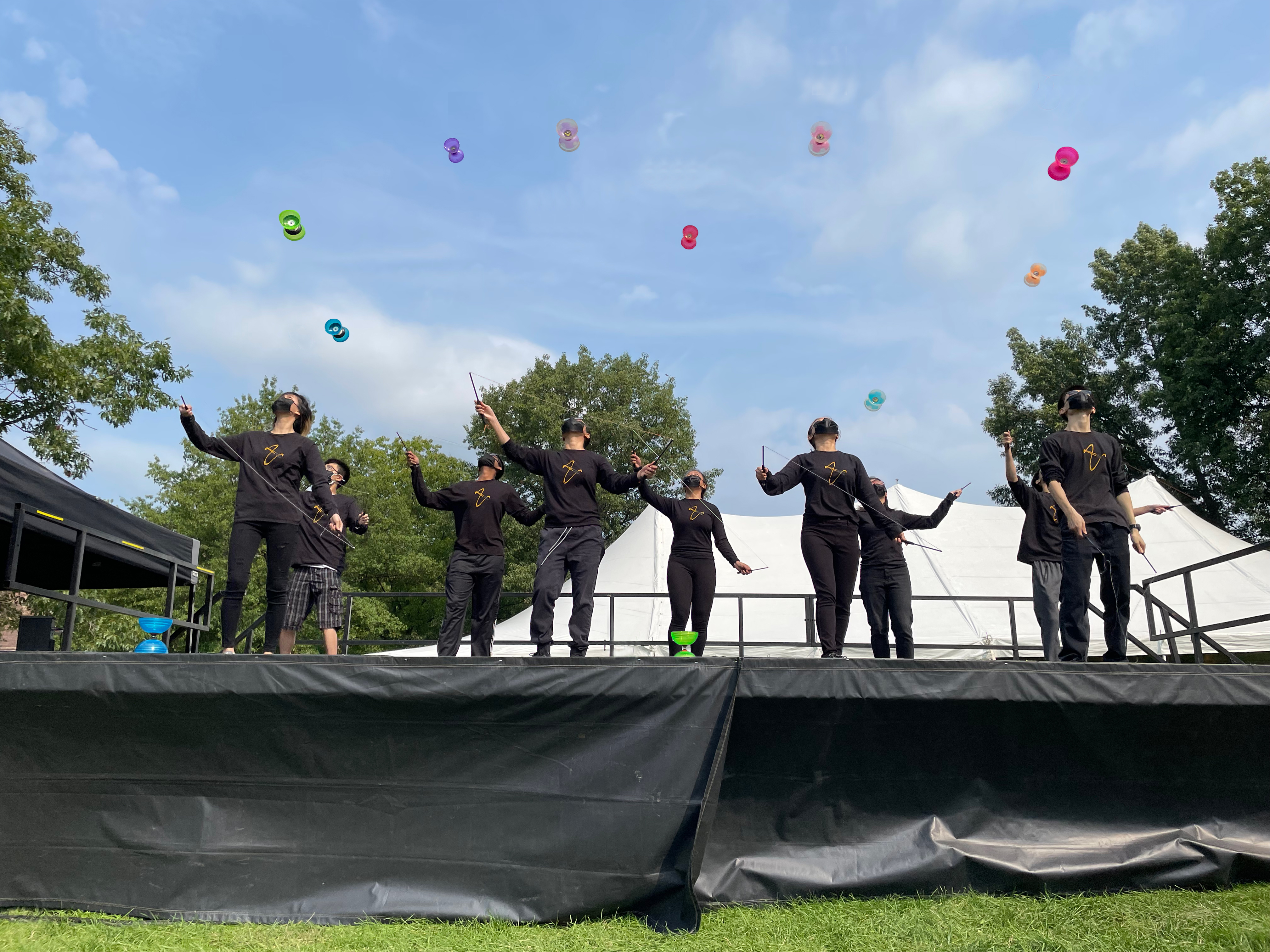 Members of Pro-Yos perform outside.