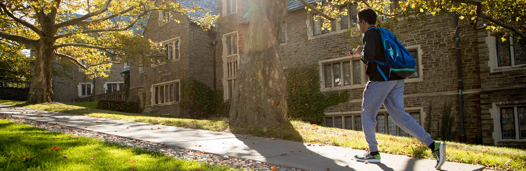 student walking on campus